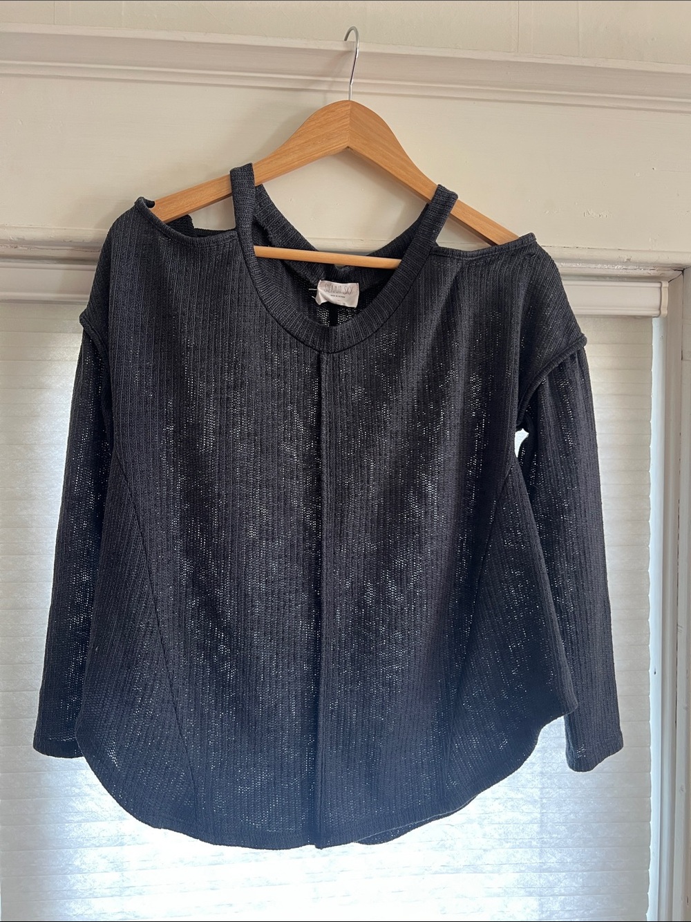 Lightweight knit shirt with shoulder cut out